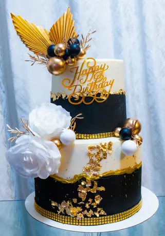 Black and gold birthday cake