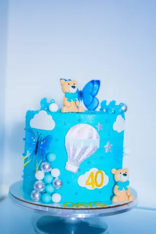 Blue celebration cake with decorative details