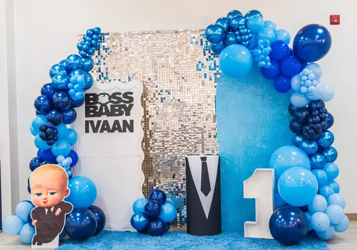 Blue Boss Baby first birthday balloon backdrop