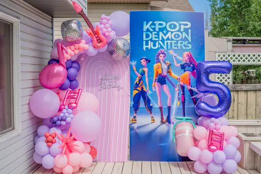 Colourful K-pop themed fifth birthday balloon backdrop