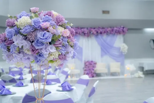 Lavender floral centerpiece and reception table