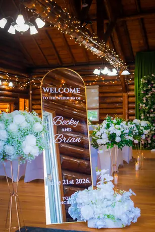 Mirrored welcome sign for a wedding reception