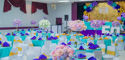 Pastel celebration tables and balloon decor