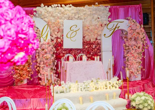Pink and red floral reception stage