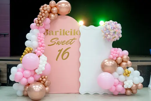 Pink and rose-gold Sweet 16 balloon backdrop