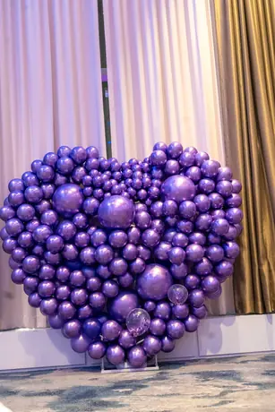 Purple heart-shaped balloon display