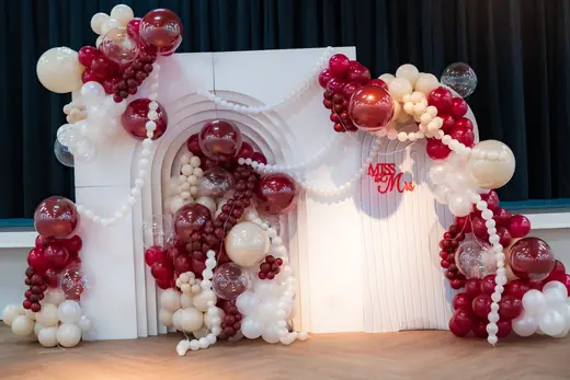 Red and cream balloon event stage