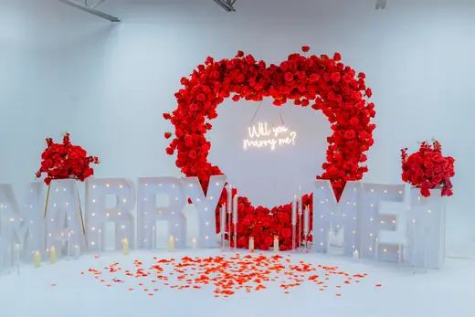 Red and white floral marriage proposal stage