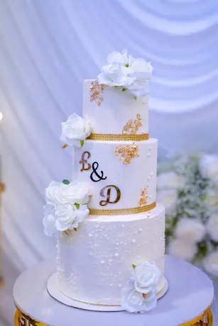 White celebration cake with floral accents