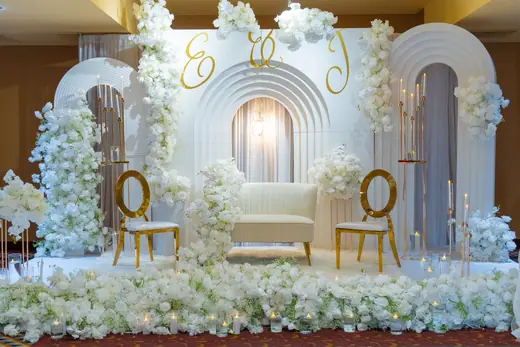 White and gold candlelit event stage