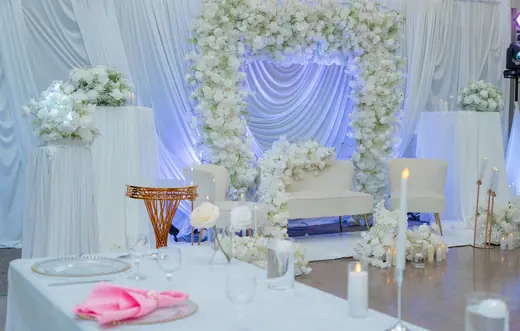 White and lavender floral event stage